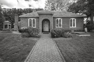 Front facade with original porch and vestry room